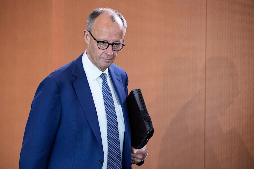 CORRECTS BYLINE - German Chancellor Friedrich Merz attends a cabinet meeting at the chancellery in Berlin, Germany, Wednesday, May 21, 2025. (AP Photo/Ebrahim Noroozi)