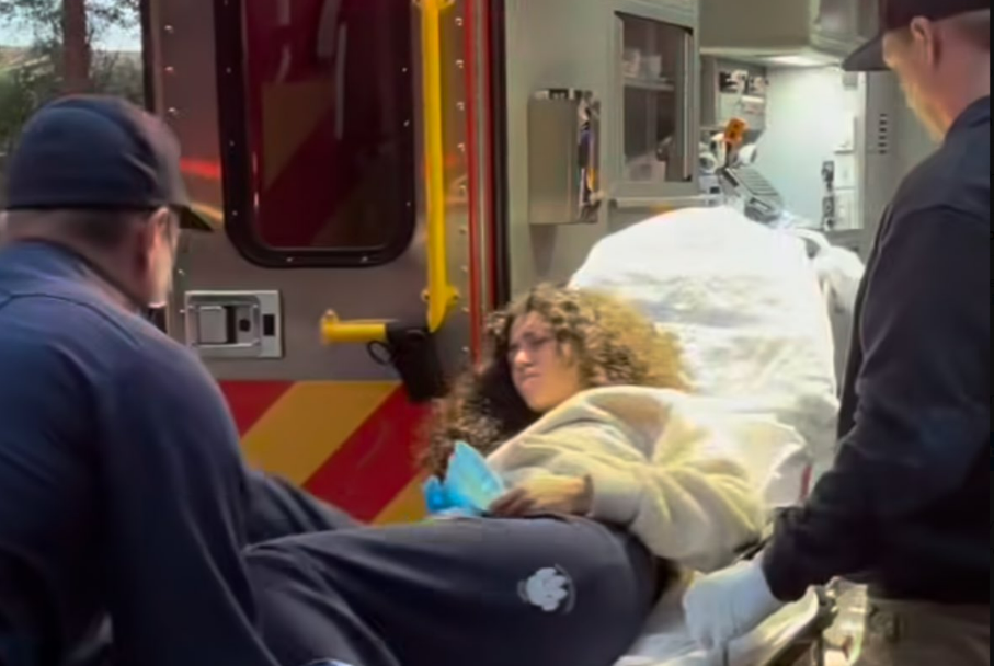 Maya Abdullah is taken into ambulance after fainting on May 18, 2025 (Instagram/guychristensen)