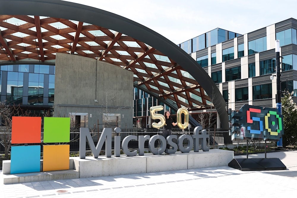 A Microsoft sign is decorated in celebration of the company's 50th anniversary at Microsoft headquarters, Friday, April 4, 2025, in Redmond, Wash (AP)