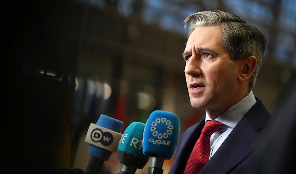 Ireland's Simon Harris speaks with the media as he arrives for a meeting of EU foreign ministers at the European Council building in Brussels, Monday, Jan. 27, 2025. (AP)