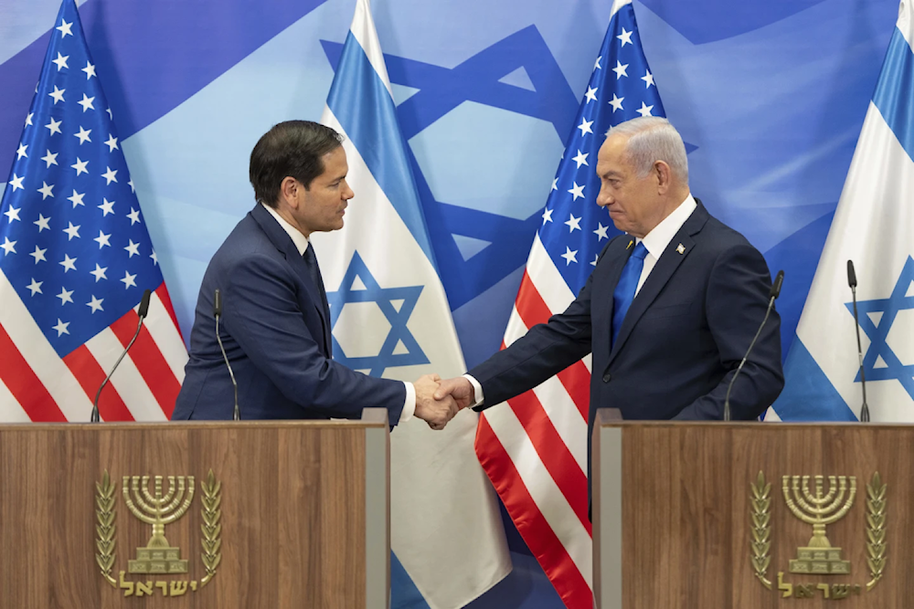 US Secretary of State Marco Rubio, left, and Israeli Occupation Prime Minister Benjamin Netanyahu shake hands during a news conference in Al-Aqsa, Occupied Palestine, February 16, 2025 (AP/Ohad Zwigenberg)