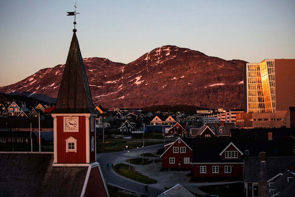 The sun sets over Nuuk, Greenland, Monday, July. 31, 2017.