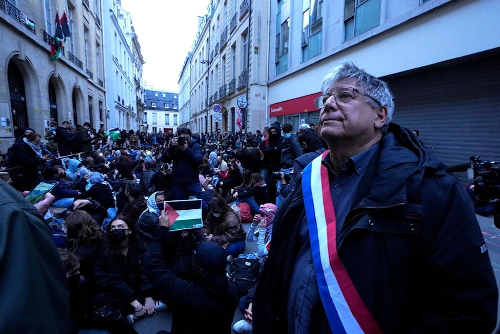 Eric Coquerel, a parliament member of the far-left La France Insoumise (The Unbowed) party attends a demonstration outside Sciences-Po university in Paris, Friday, April 26, 2024 (AP)
