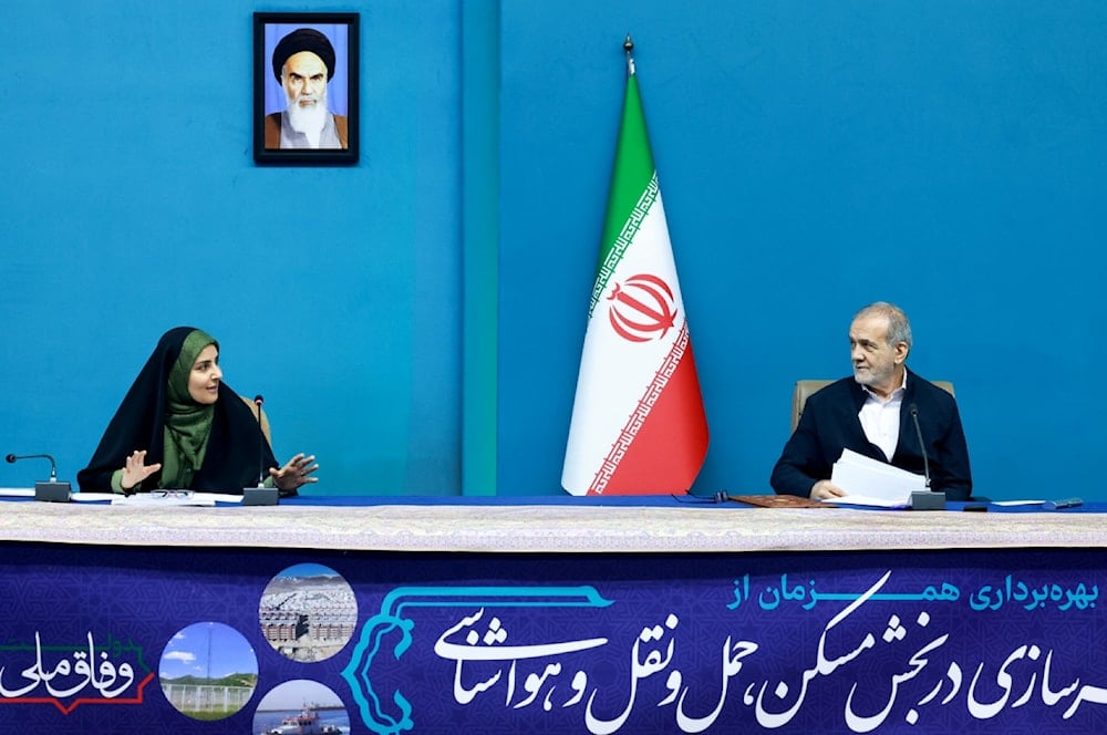 President Masoud Pezeshkian (right) and Minister of Roads and Urban Development Farzaneh Sadeq attend the cabinet meeting on May 24, 2025.