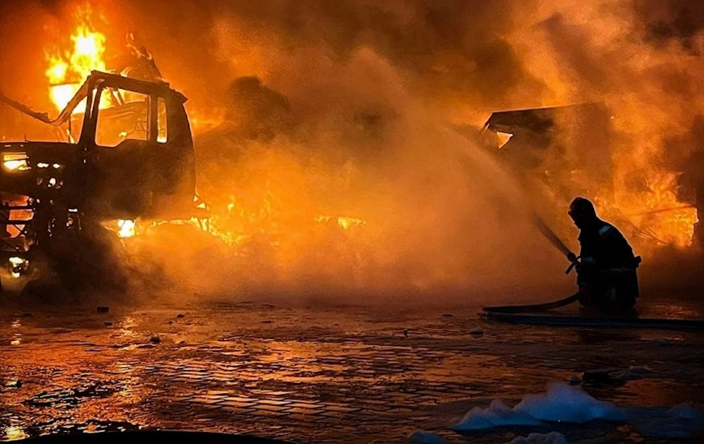 In this photo provided by the Ukrainian Emergency Service, firefighters put out the fire at Odesa port infrastructure. 
