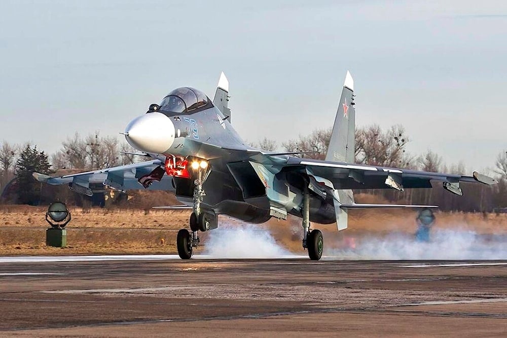 In this photo taken from video provided by the Russian Defense Ministry Press Service on Monday, Jan. 31, 2022, Russian Su-30SM2 fighter jet takes off from the airfield in Chernyakhovsk, Russia.