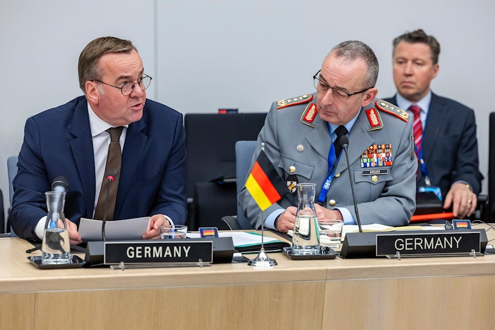 Germany's Defense Minister Boris Pistorius, left, talks as he sits next to German Inspector General of the Armed Forces Carsten Breuer during a meeting at NATO headquarters in Brussels, Friday, April 11, 2025 (AP)