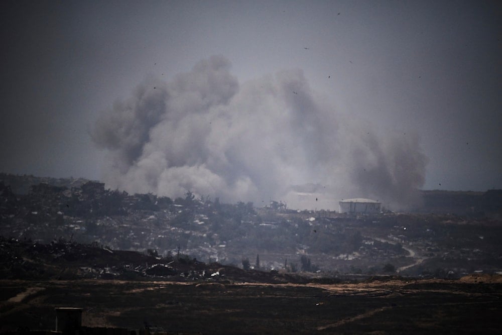 Smoke rises to the sky following an Israeli airstrike in the northern of Gaza Strip as seen from southern Israel, Friday, May 23, 2025 (AP)