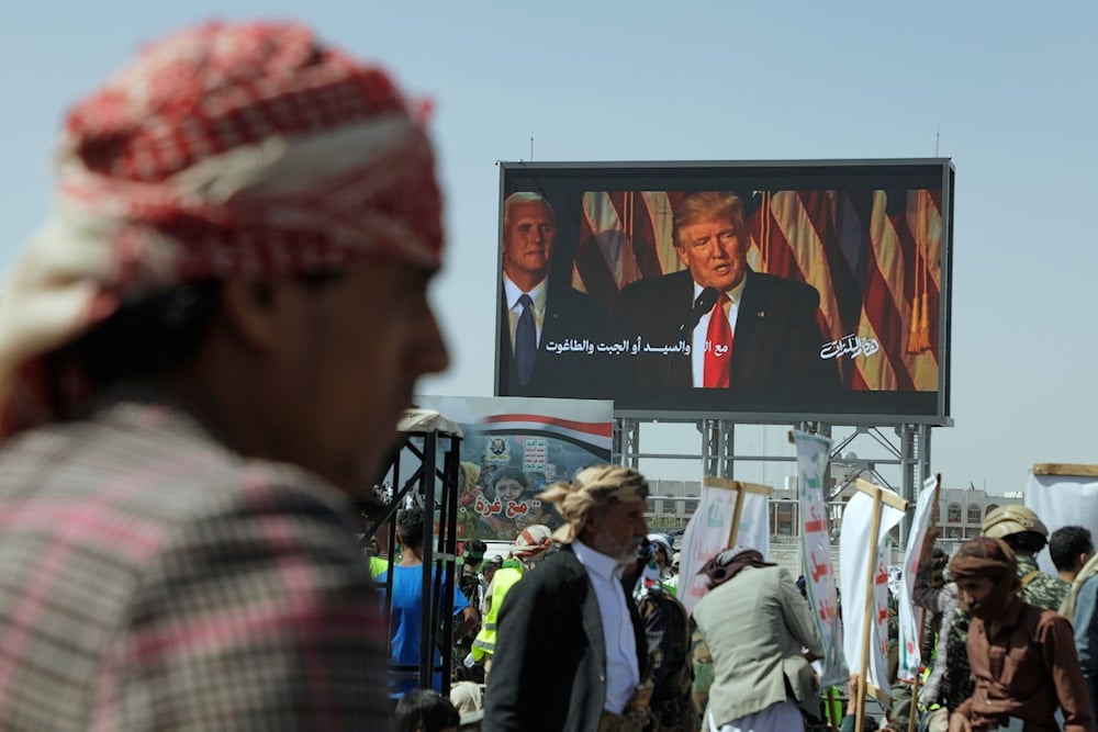 Ansar Allah supporters chant slogans during a weekly anti-US and anti-