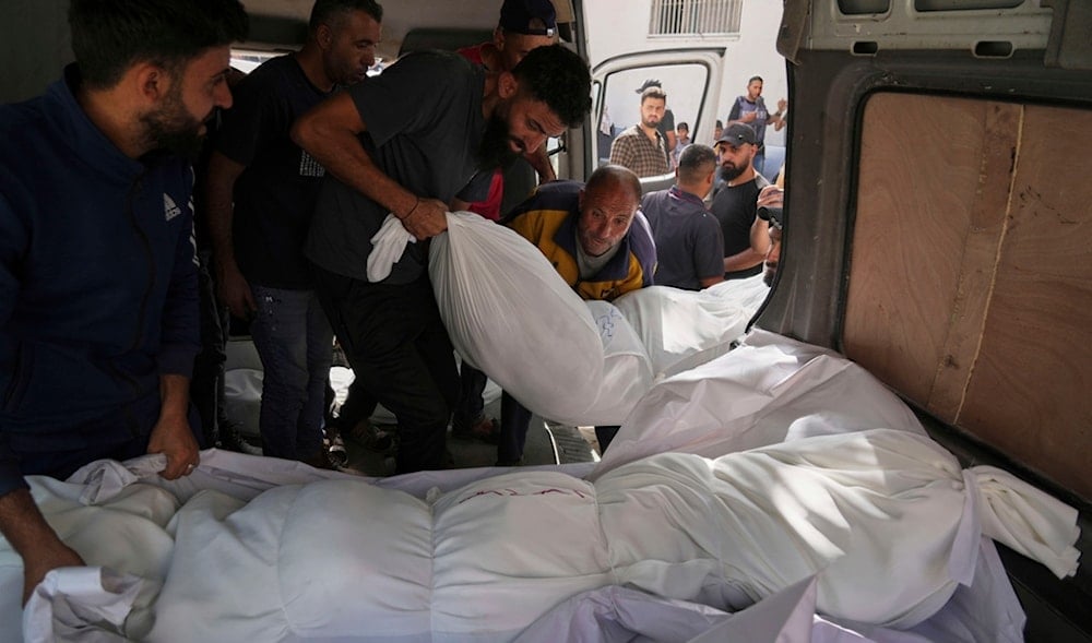 Bodies of Palestinians killed in Israeli airstrikes are brought to Al-Shifa Hospital in Gaza City, Monday, May 26, 2025. (AP)