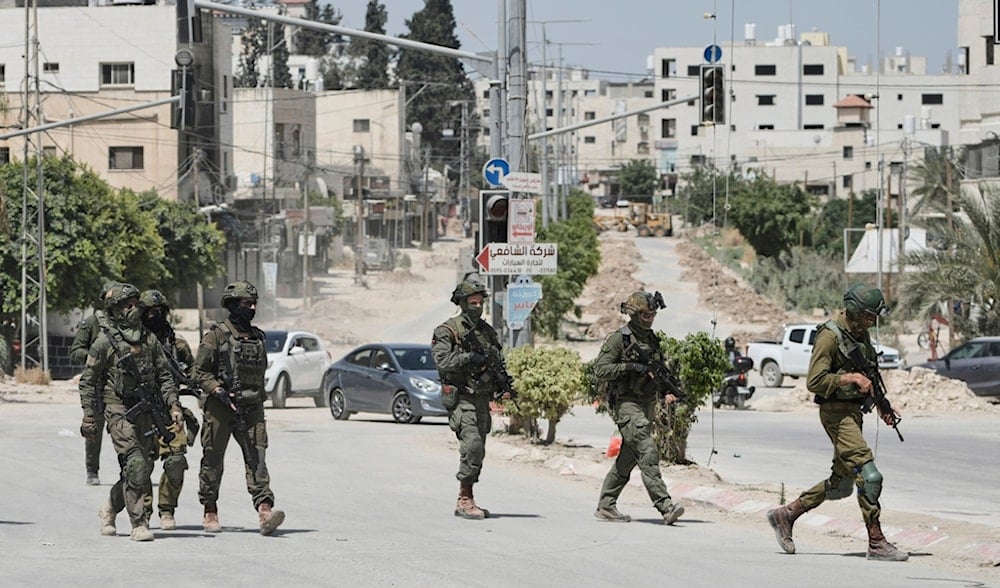 Israeli soldiers are seen during a raid in Tulkarm, West Bank on Monday, May 26, 2025. (AP)