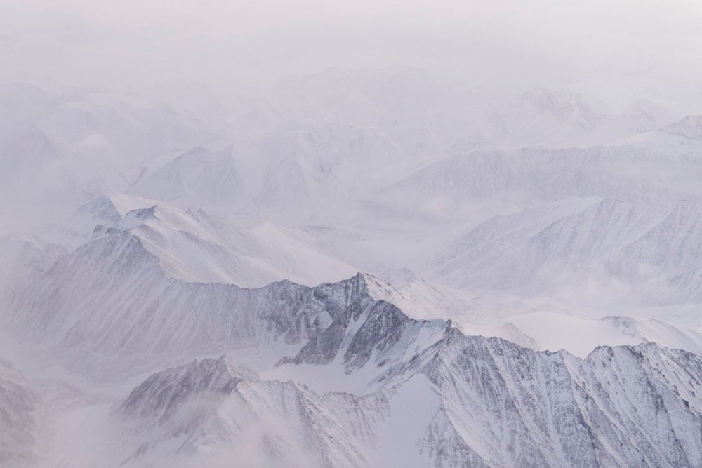 Snow covers the mountains of the Brooks Range in the Arctic National Wildlife Refuge, Monday, Oct. 14, 2024, near Kaktovik, Alaska (AP)