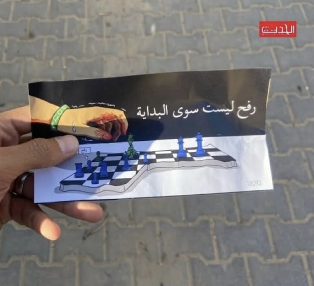 The occupation drops leaflets