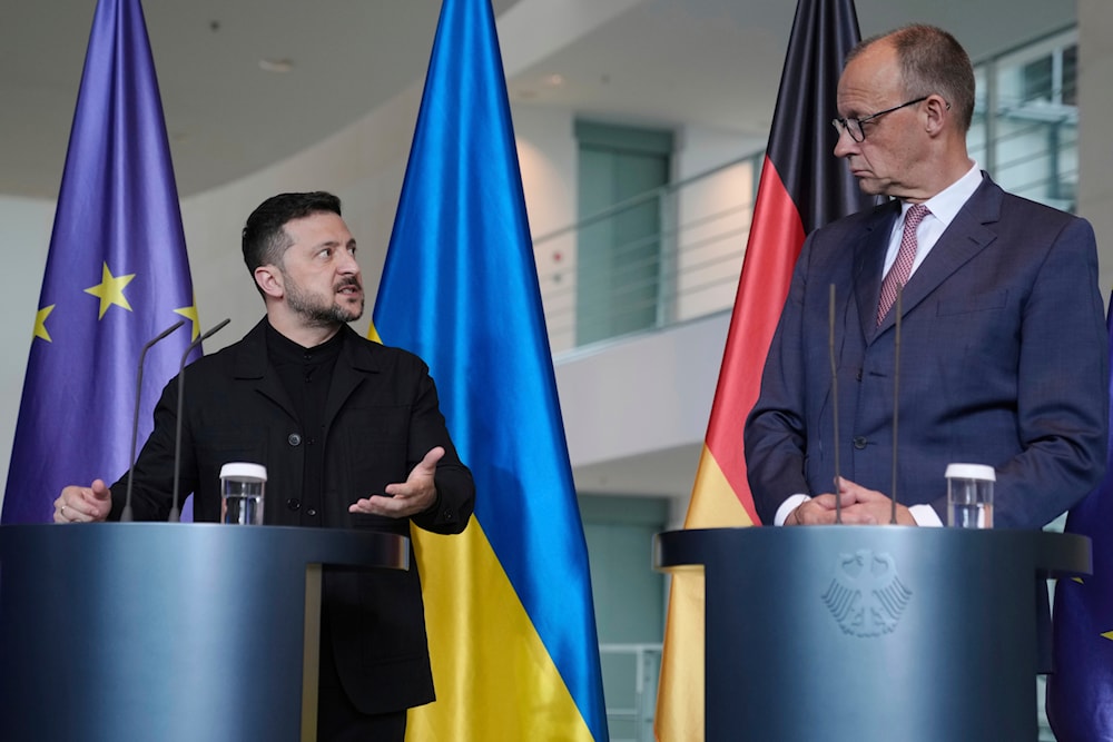 Germany's Chancellor Friedrich Merz, right, and Ukraine's President Volodymyr Zelenskyy attend a news conference at the chancellery in Berlin, Germany, Wednesday, May 28, 2025 (AP)