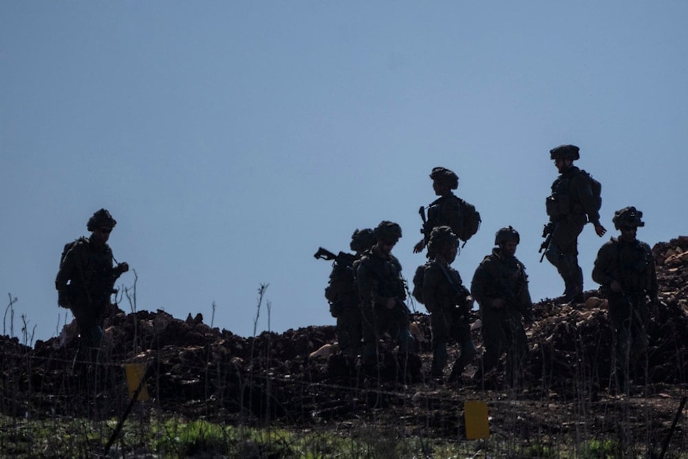 Israeli forces operate in a buffer zone in southern Lebanon as seen from northern occupied Palestine, Tuesday, February 18, 2025 (AP)
