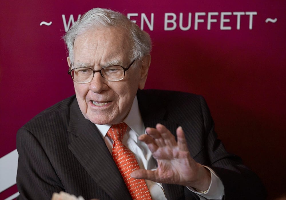 Warren Buffett, Chairman and CEO of Berkshire Hathaway, speaks during a game of bridge following the annual Berkshire Hathaway shareholders meeting in Omaha, Nebraska, United States, May 5, 2019 (AP)