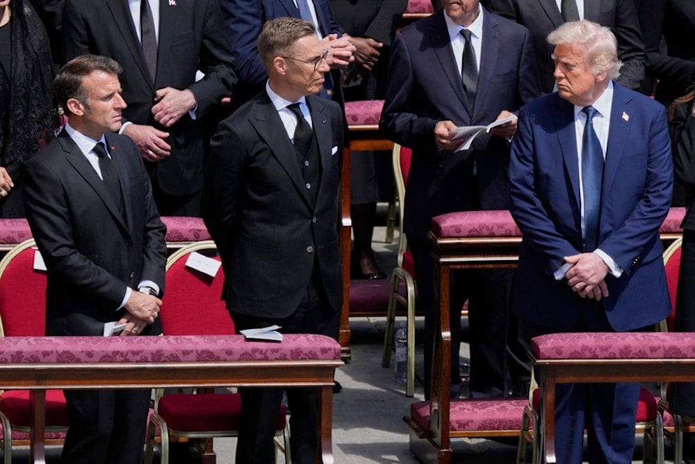 President Donald Trump, right, French President Emmanuel Macron, left, and Finland's President Alexander Stubb, attend the funeral of Pope Francis in St. Peter's Square at the Vatican, Saturday, April 26, 2025 (AP)
