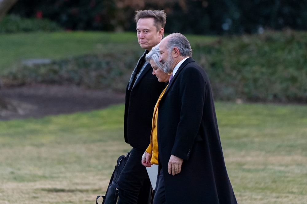Elon Musk, from left, White House chief of staff Susie Wiles and Commerce Secretary Howard Lutnick walk to join President Donald Trump on Marine One on the South Lawn of the White House, March 7, 2025, in Washington. (AP)