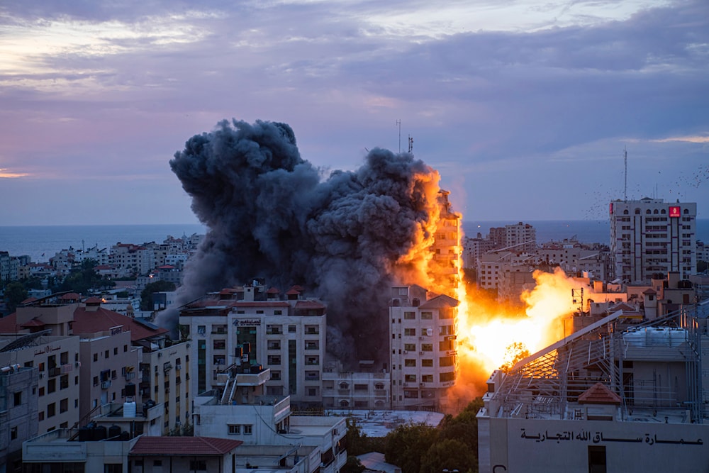 Fire and smoke rise following an Israeli airstrike in Gaza City, Oct. 7, 2023. (AP)