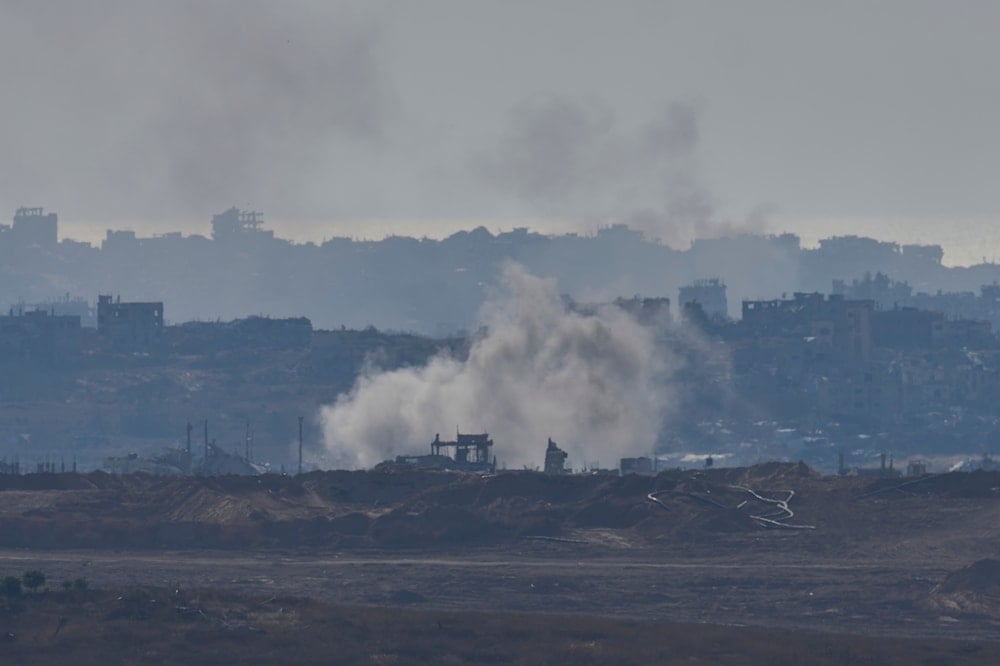 Smoke rises following an Israeli army bombardment in the Gaza Strip, seen from southern occupied Palestine, on May 29, 2025. (AP Photo/Ohad Zwigenberg)