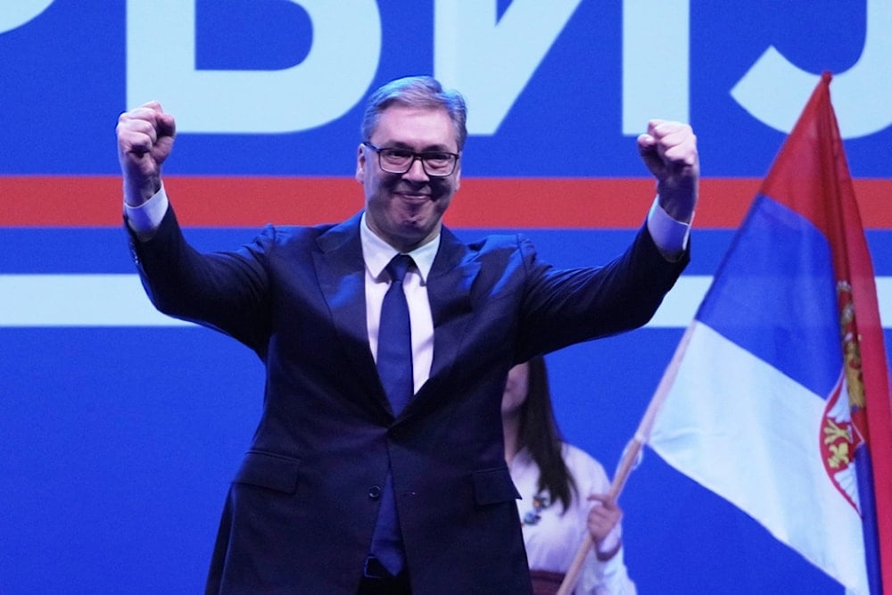 Serbia's President Aleksandar Vucic greets his supporters in Belgrade, Serbia, Saturday, April 12, 2025 (AP)