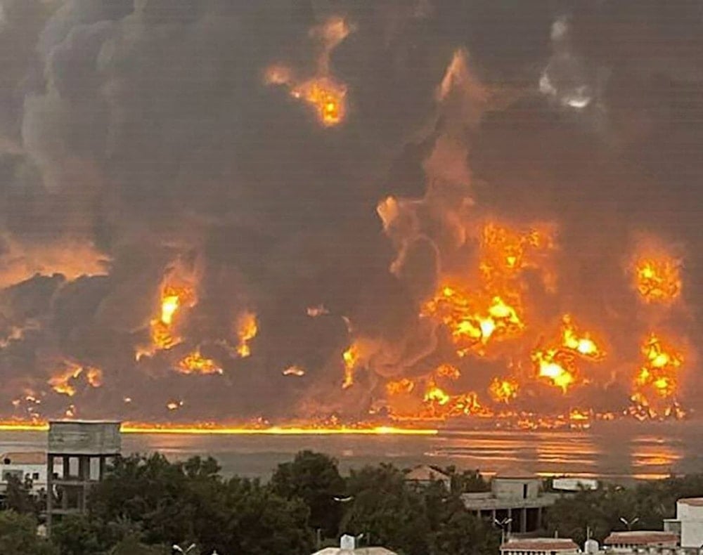 Flames rise over the port of al-Hodeidah, Yemen, following Israeli airstrikes on May 5, 2025 (Social media)