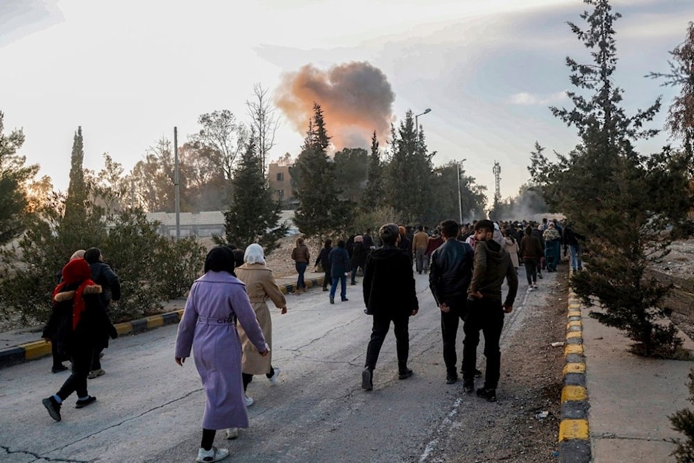 A Turkish drone strike hits near protesters demanding an end to the war around the Tishreen Dam, Syria, Wednesday, January 8, 2025 (AP)
