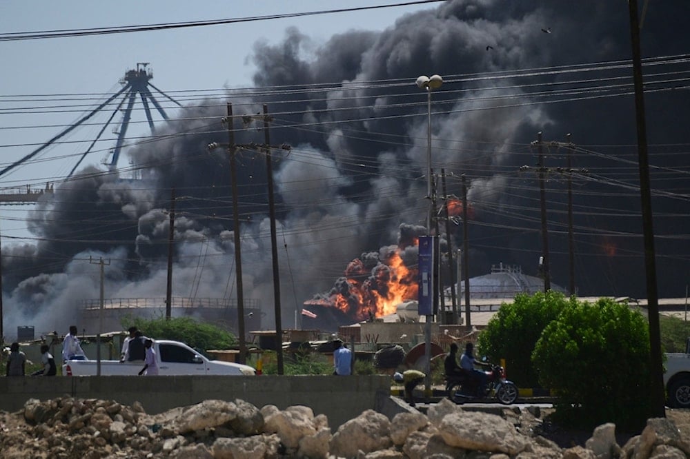 Smoke billows after drone strikes by the paramilitary Rapid Support Forces (RSF) targeted the northern port in the Red Sea city of Port Sudan, Sudan, Tuesday, May 6, 2025 (AP)