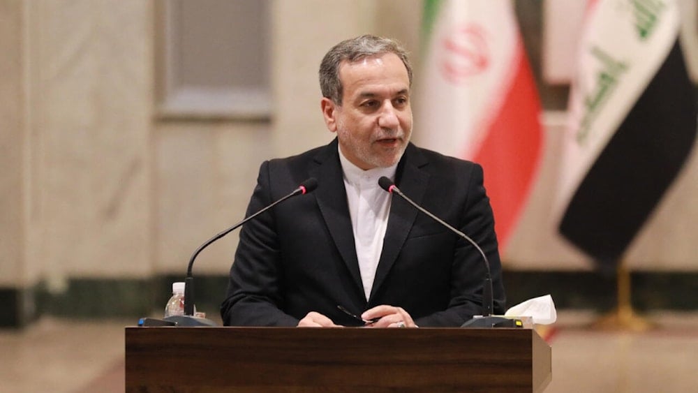 Iranian Foreign Minister Abbas Araghchi speaks during a joint press conference with his Iraqi counterpart in Baghdad on October 13, 2024. (Murtaja Lateef/AFP)