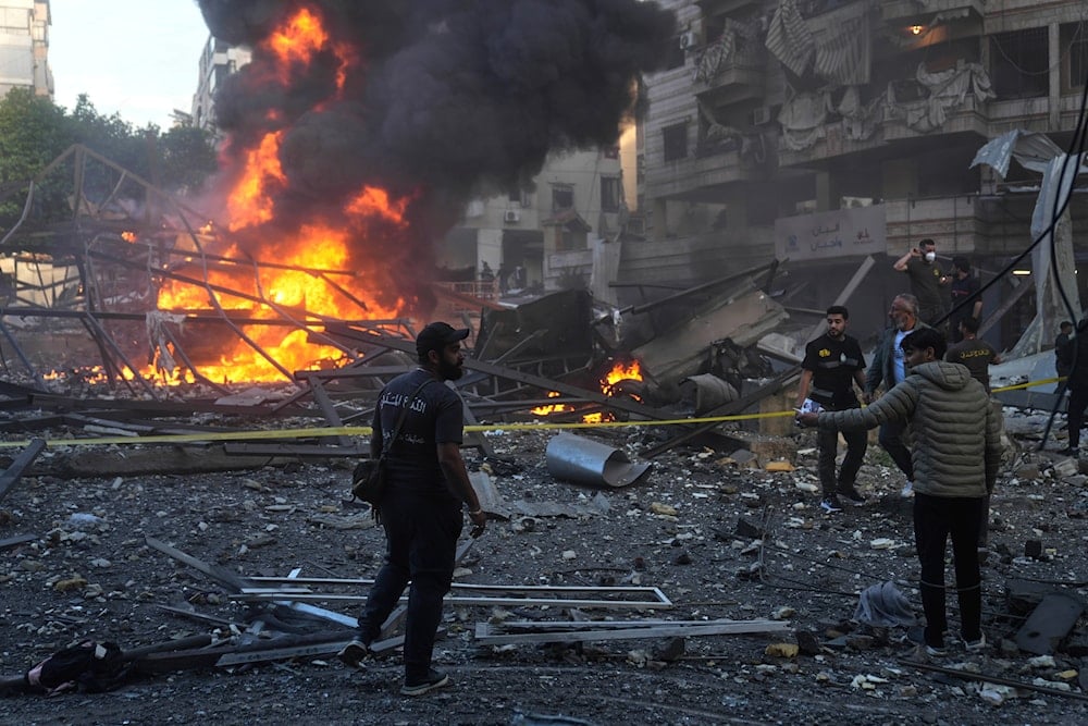 Flames rise from a metal tent hit by an Israeli airstrike on Dahiyeh in the southern suburb of Beirut, Lebanon, Sunday, April 27, 2025 (AP)