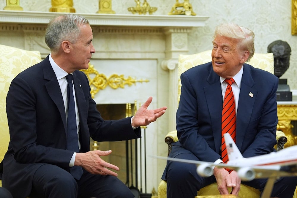 President Donald Trump meets Canadian Prime Minister Mark Carney in the Oval Office of the White House, Tuesday, May 6, 2025, in Washington (AP)