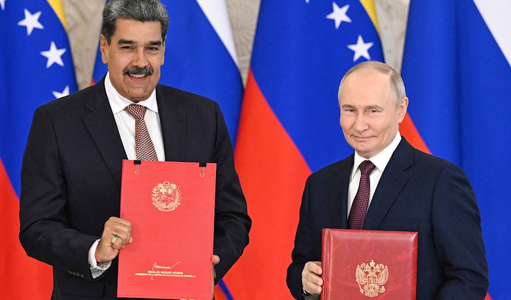 Maduro and Putin sign 10 year cooperation treaty on Victory Day