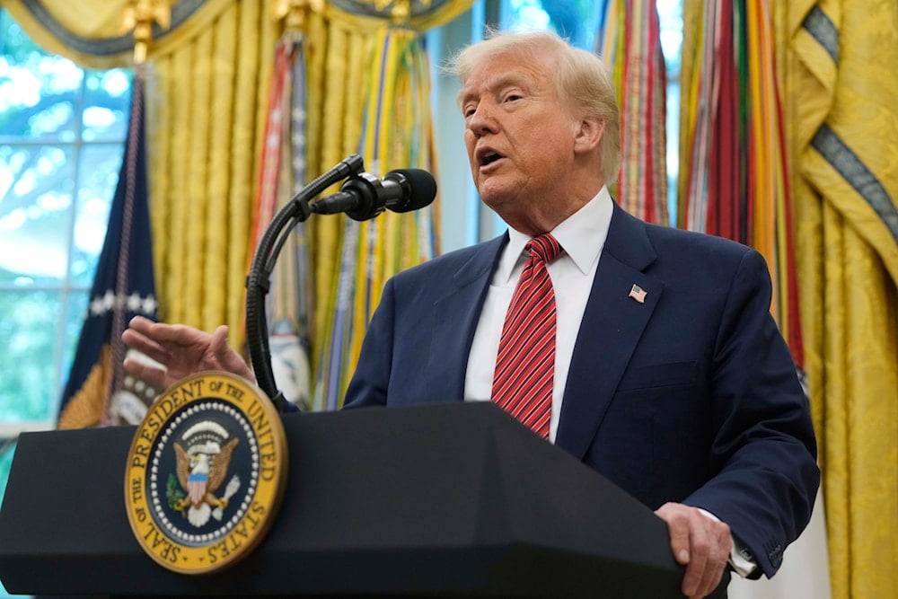 President Donald Trump speaks after David Perdue was sworn in as U.S. Ambassador to China during a ceremony in the Oval Office of the White House, on May 7, 2025, in Washington. (AP Photo/Mark Schiefelbein)