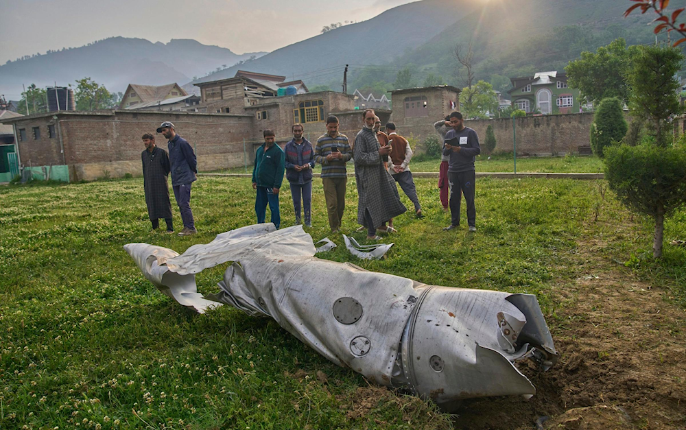A photo-journalist, took pictures of what appears to be the wreckage of a downed fighter jet in Srinagar, the main city in Indian-occupied Kashmir in an undated photo (Dar Yasin/AP)