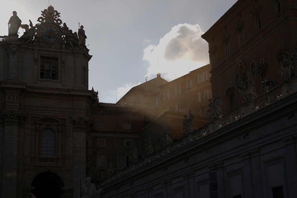 White smoke billows from the chimney of the Sistine Chapel during the conclave to elect a new pope, at the Vatican, Thursday, May 8, 2025. (AP)