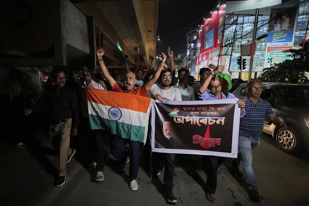 People holding Indian national flags rally's in support of the Indian Army as they celebrate the success of 'Operation Sindoor'; in Guwahati, India, May 8, 2025 (AP/Anupam Nath)