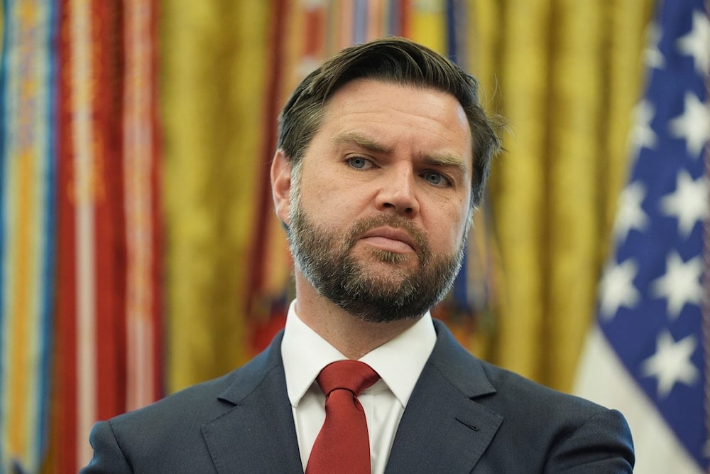 Vice President JD Vance listens as President Donald Trump speaks with reporters after announcing a trade deal with United Kingdom in the Oval Office of the White House, Thursday, May 8, 2025, in Washington (AP)