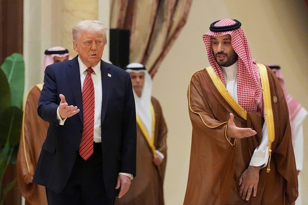President Donald Trump arrives with Saudi Crown Prince Mohammed bin Salman for the group photo with Gulf Cooperation Council leaders during the GCC Summit in Riyadh, Saudi Arabia, Wednesday, May 14, 2025 (AP)