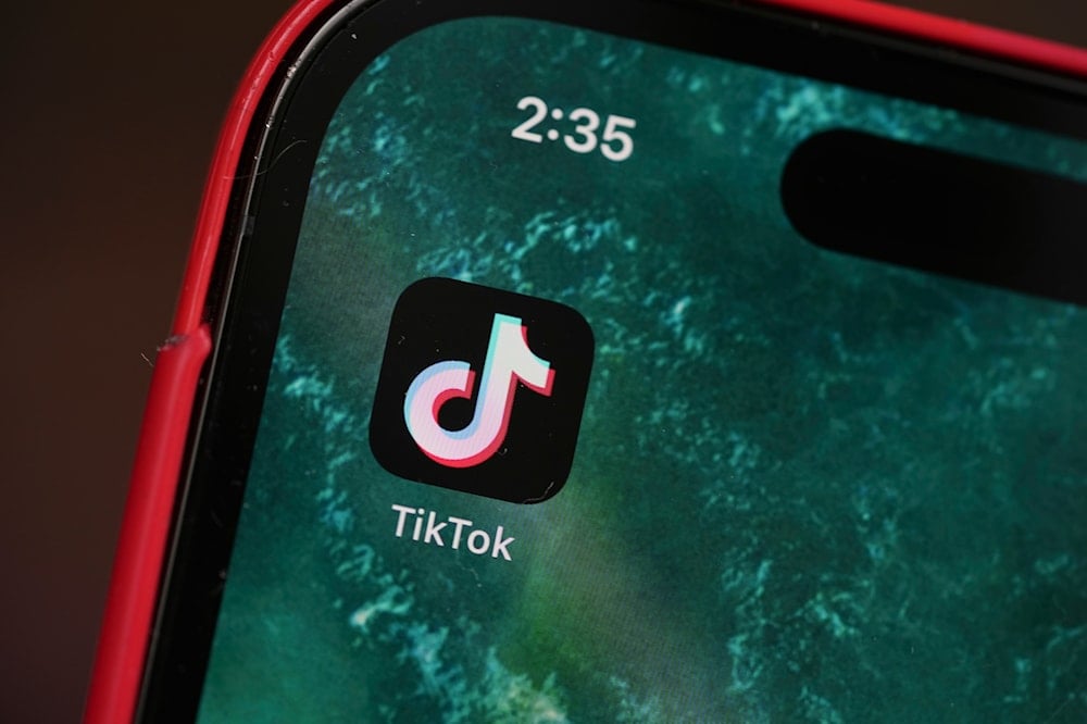 The logo for TikTok is displayed on a mobile phone, Friday, Jan. 17, 2025, in Denver (AP)