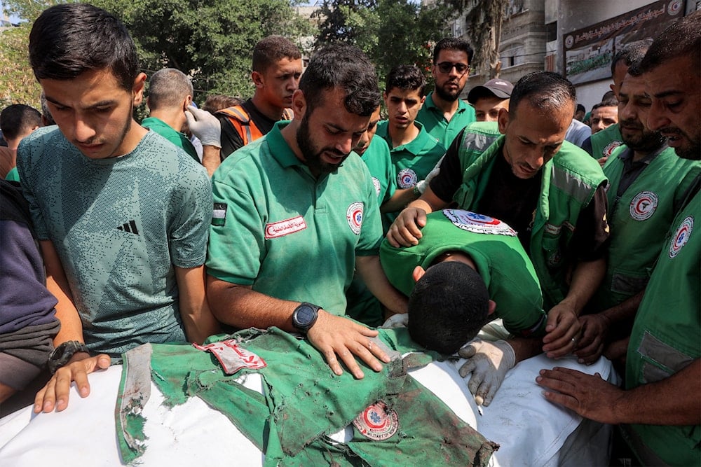 52 killed by Israeli forces in Gaza, including paramedics, journalist