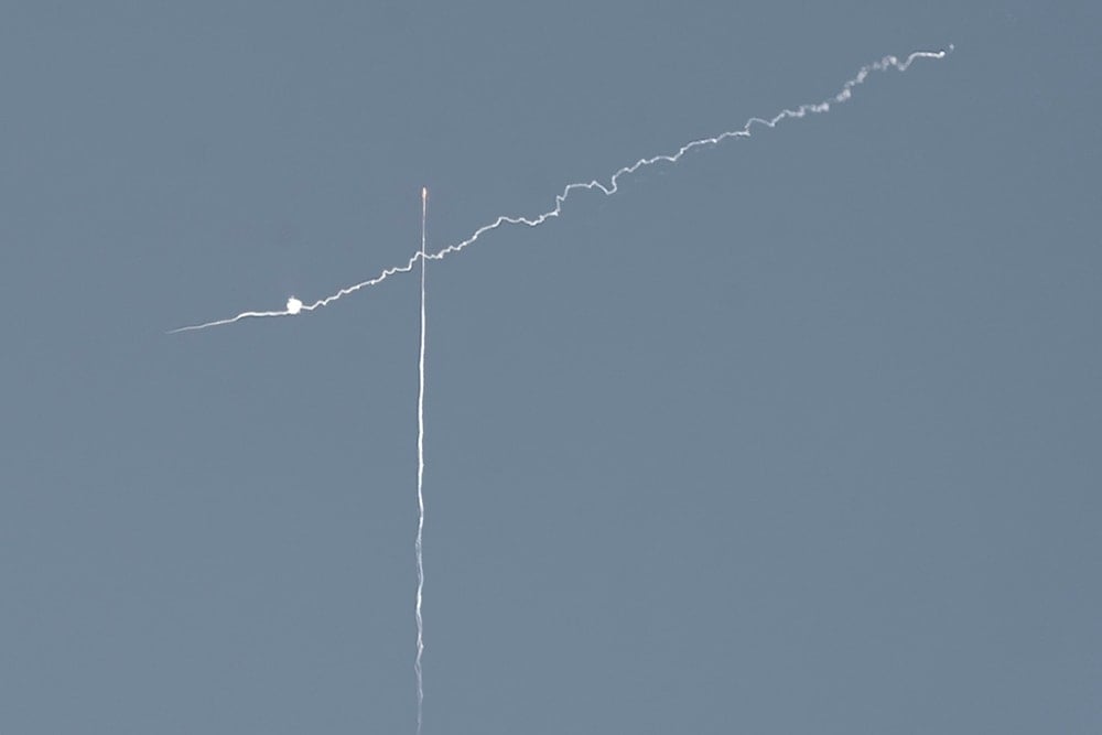 The Israeli air defense system fires to intercept a missile launched from Yemen as seen from central occupied Palestine, Wednesday, June 10, 2025 (AP)