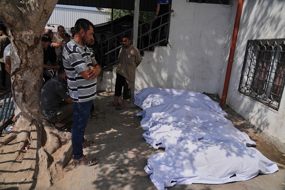 Palestinians mourn their relatives who were killed in an Israeli military strike on Gaza, during their funeral in al-Shifa hospital in Gaza City, Tuesday, June 10, 2025. (AP)
