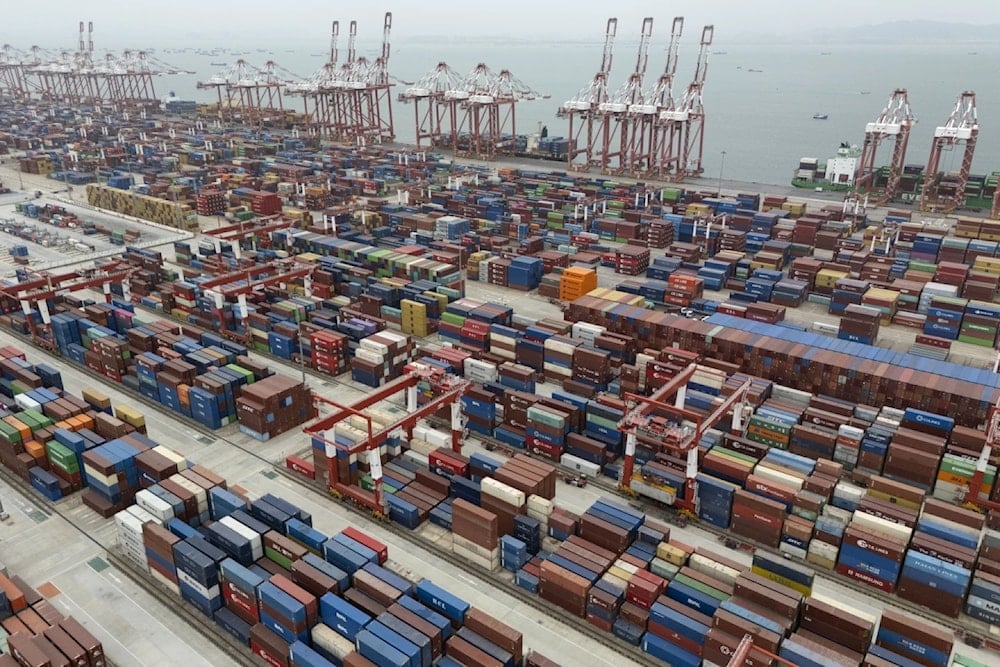 Shipping containers are seen ready for transport at the Guangzhou Port in the Nansha district in southern China's Guangdong province, April 17, 2025 (AP/NG Han Guan)