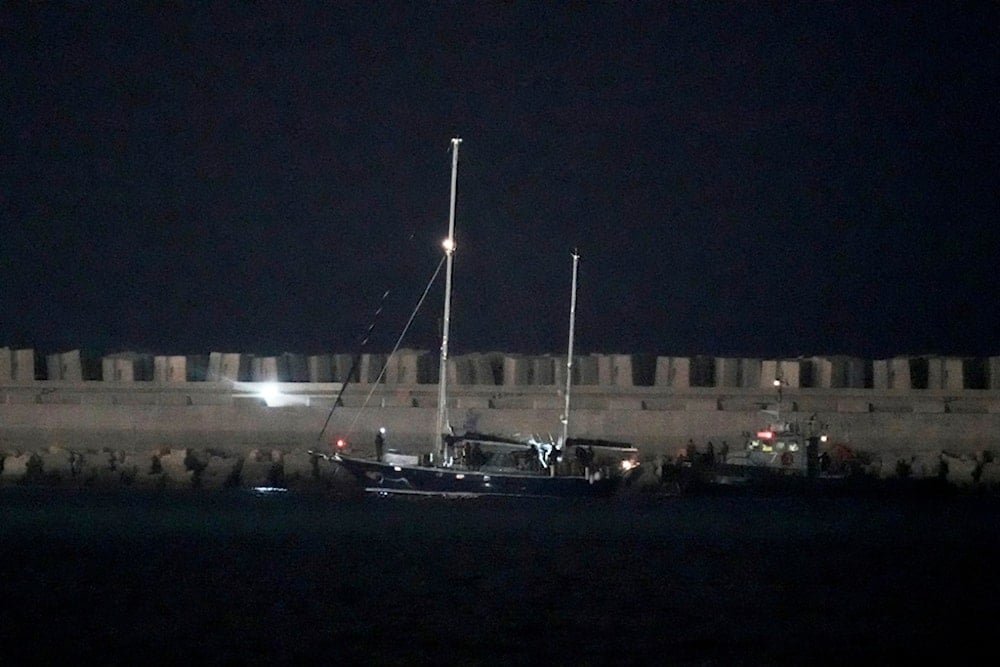 The Gaza-bound aid boat, Madleen, under the escort of Israeli naval forces, enters to Asdod Port in southern occupied Palestine after being seized by Israeli forces, Monday, June 9, 2025 (AP)