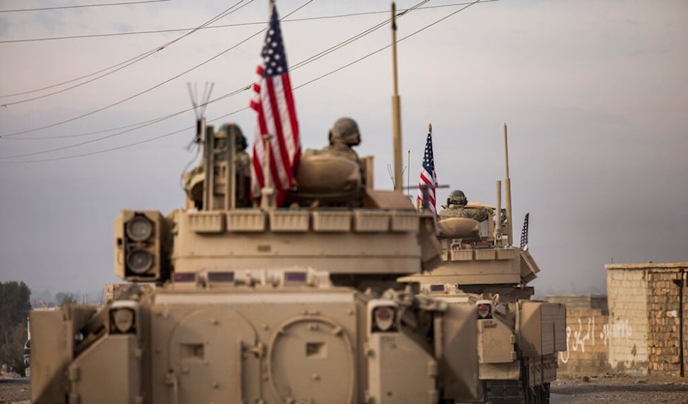 American soldiers drive fighting vehicles during a joint exercise with Syrian Democratic Forces at the countryside of Deir Ezzor in northeastern Syria, Wednesday, Dec. 8, 2021. .(AP)