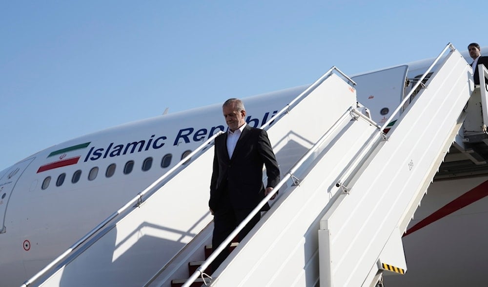 Iranian President Masoud Pezeshkian arrives at the Baghdad International Airport in Baghdad, Iraq, Wednesday Sept. 11, 2024 (AP)