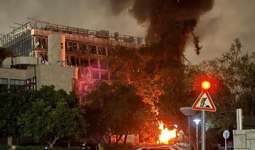 The Israeli Weizmann Institute of Science in Rehovot, Tel Aviv, burns after being targeted by an Iranian missile, June 15, 2025 (Social Media)