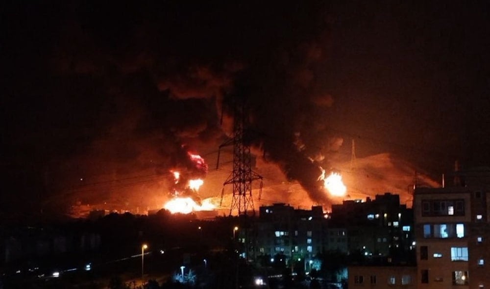 The Haifa oil refinery burns after being targeted by an Iranian missile, June 15, 2025 (Social Media)