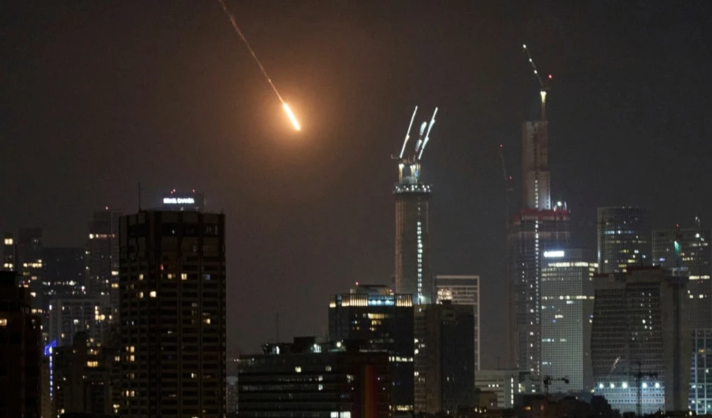 The trace of a projectile is seen before hitting Tel Aviv, early Saturday, June 14, 2025. (AP)