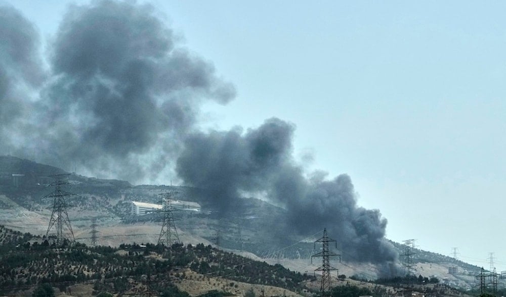 Smoke rises from an oil storage facility after it being struck by an Israeli strike on Saturday, in Tehran, Iran, Monday, June 16, 2025. (AP)